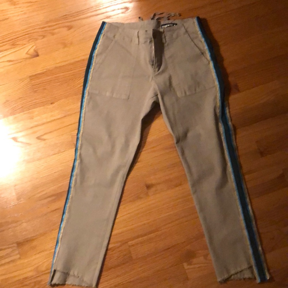 Pam & Gela uniform side stripe step hem pants.